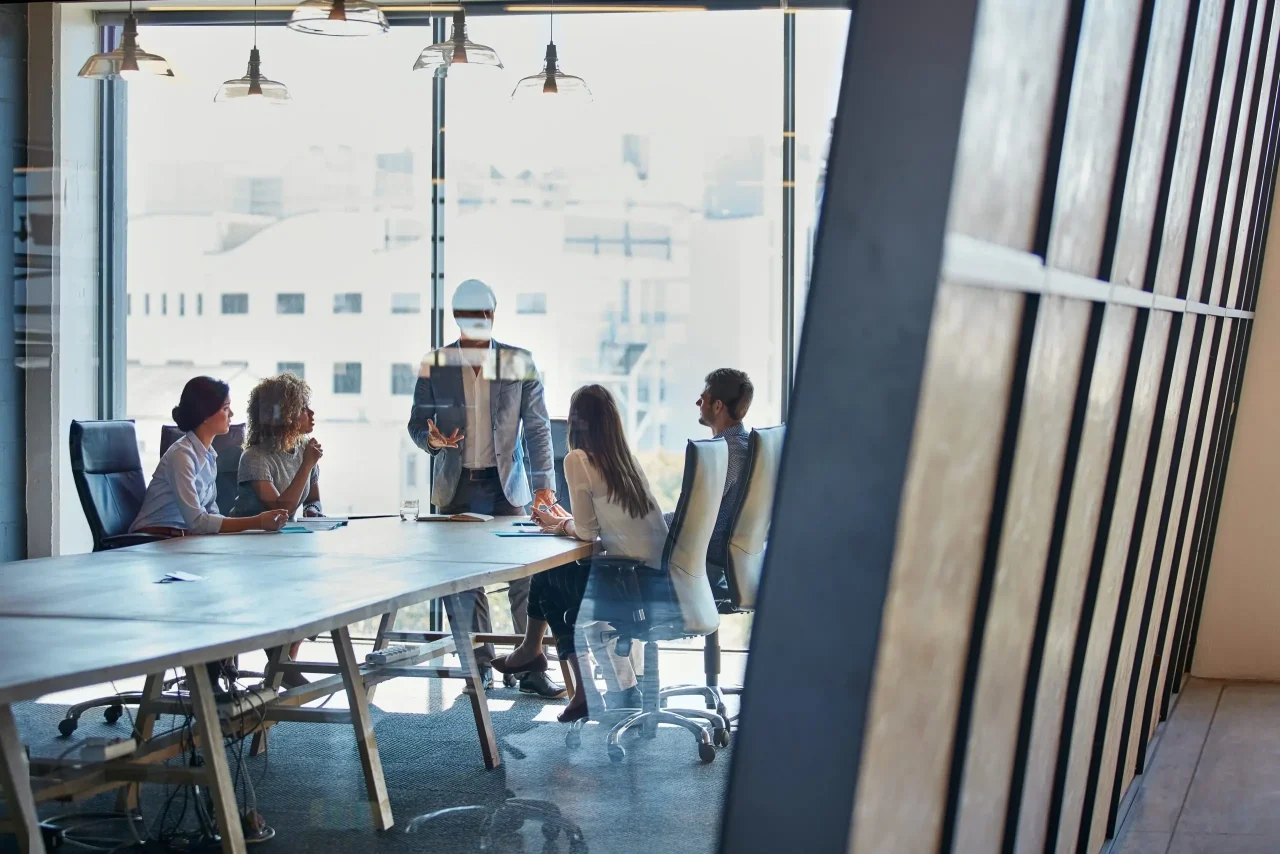 Business meeting in modern office setting